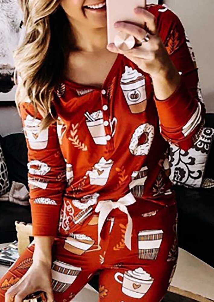 Sleepwear Hot Cocoa V-Neck Button Blouse And Tie Pants Pajamas Set in Orange. Size: M
Sleepwear Hot Cocoa V-Neck Button Blouse And Tie Pants Pajamas Set in Orange. Size: M