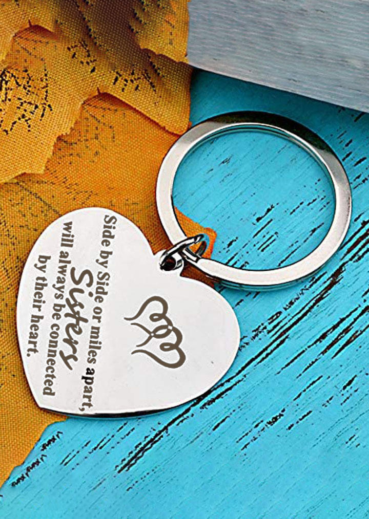 Keychains Side By Side Or Miles Apart Sisters Will Always Be Connected By Their Heart Keychain in Silver. Size
Keychains Side By Side Or Miles Apart Sisters Will Always Be Connected By Their Heart Keychain in Silver. Size