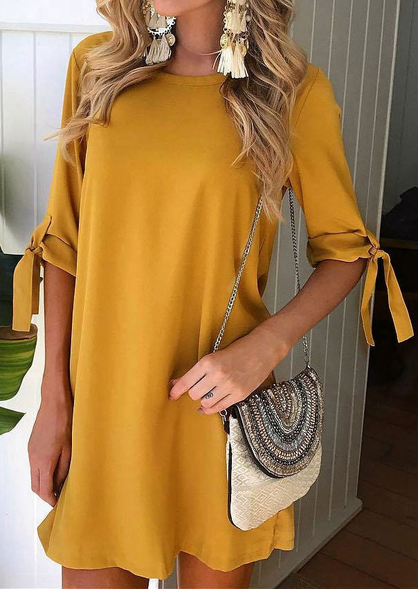 

Mini Dresses Tie O-Neck Mini Dress in Yellow. Size: M