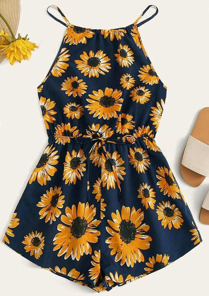 

Jumpsuits & Rompers Spaghetti Strap Floral Romper in Navy Blue. Size