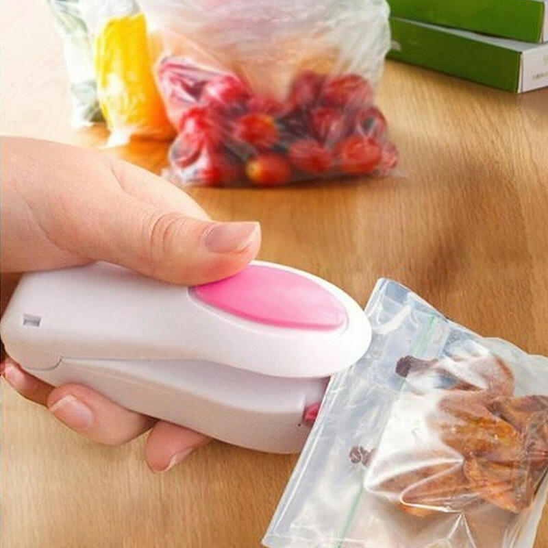 

Home Decor Mini Handheld Heat Sealing Smart Plastic Bag Sealer in White. Size