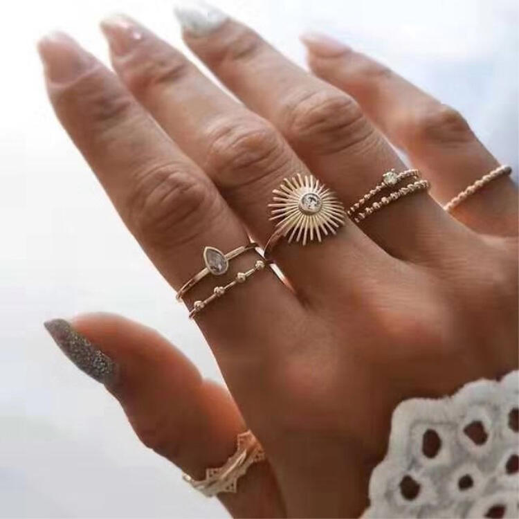 

Rings 7Pcs Fashion Sunflower Rhinestone Ring Set in Gold. Size