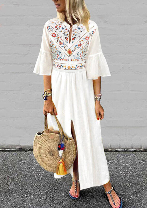 

Maxi Dresses Floral Ruffled Slit Maxi Dress in White. Size: ,M