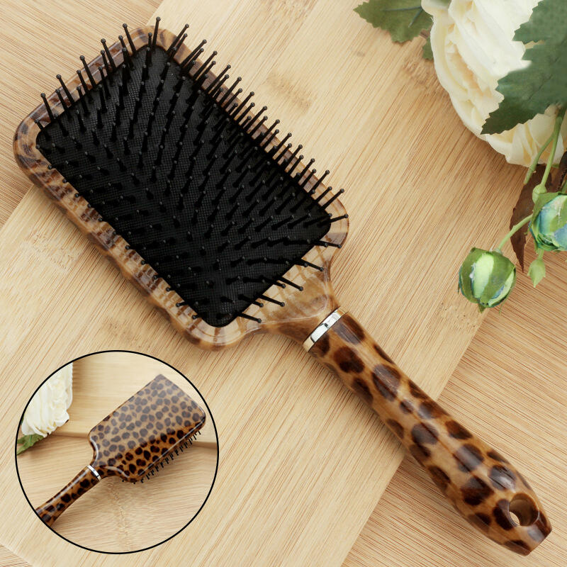 

Hair Accessories Leopard Massage Hair Brush Comb with Grip Handle in Leopard. Size