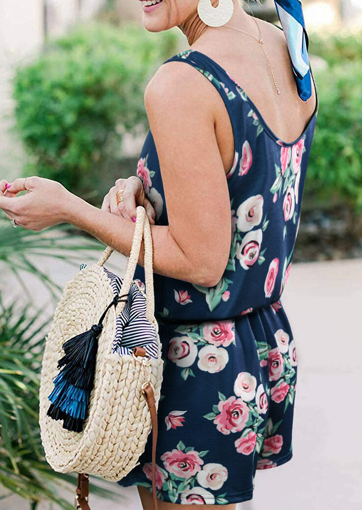 

Jumpsuits & Rompers Floral Pocket Drawstring Romper in Navy Blue. Size