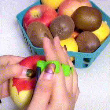 

Stainless Steel Vegetable Fruit Finger Peeler Tool in Orange. Size