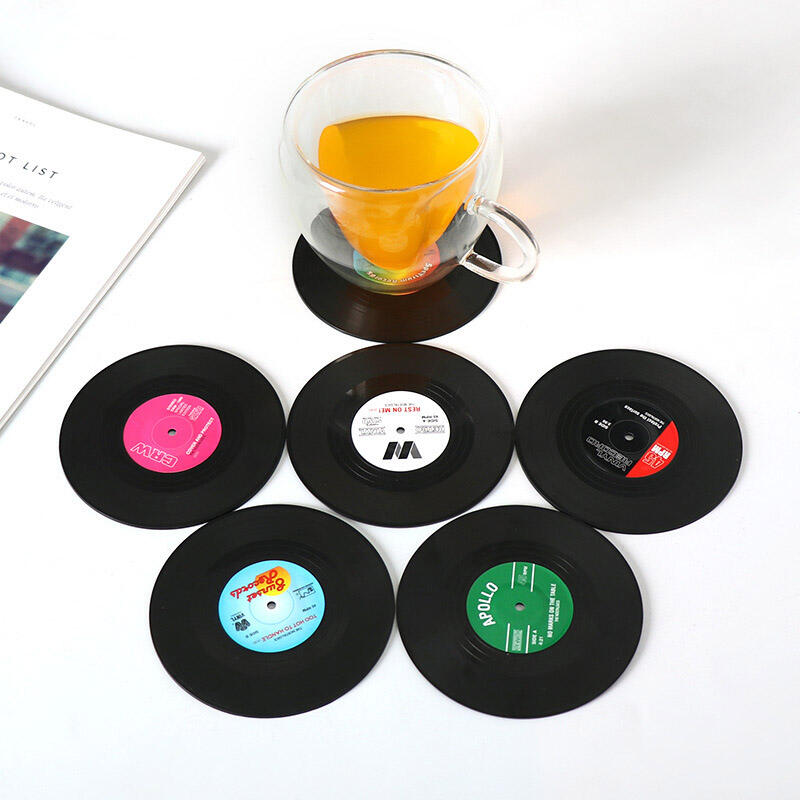 

Home Decor 6Pcs Funny Vinyl Disk Coaster Cup Mat in Black. Size