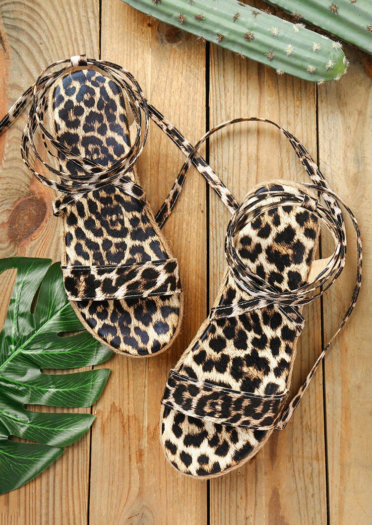 

Sandals Leopard Criss-Cross Tie Platform Sandals in Leopard. Size