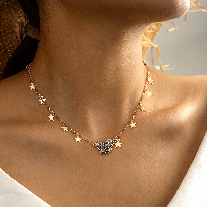 

Necklaces Rhinestone Butterfly Star Necklace in Gold. Size
