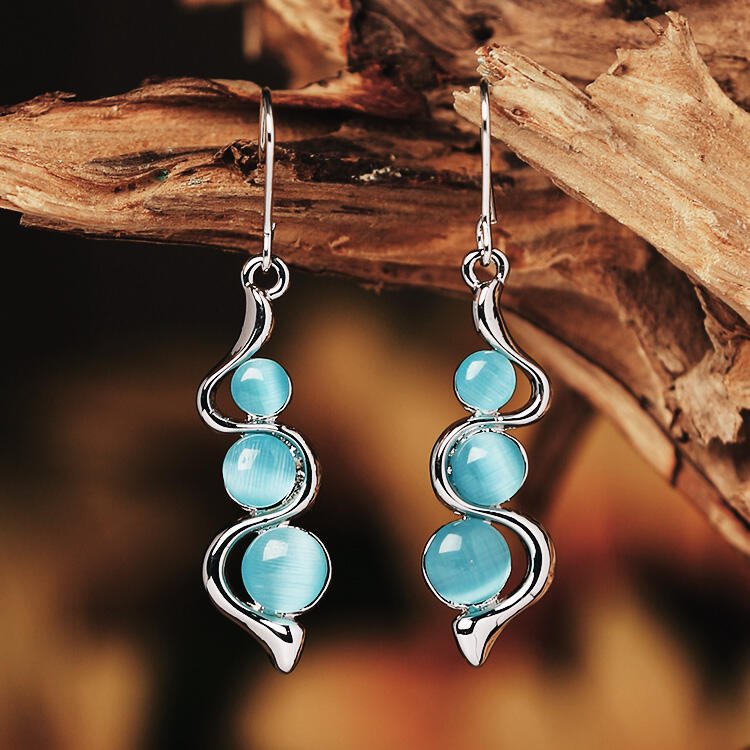 

Earrings Bohemian Creative Gemstone Wave Curved Pendant Earrings in Light Blue. Size