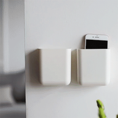 

Home Decor Universal Wall Mounted Remote Holder in White. Size