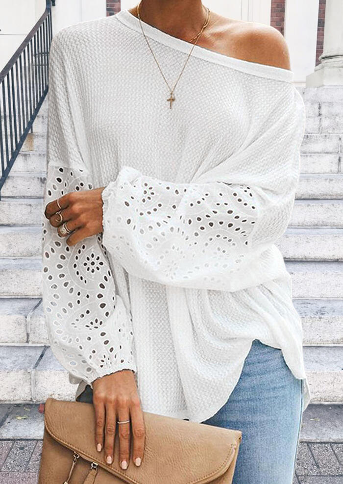 

Blouses Hollow Out Elastic Cuff Blouse in White. Size