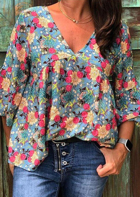 

Blouses Floral Ruffled V-Neck Blouse in Blue. Size