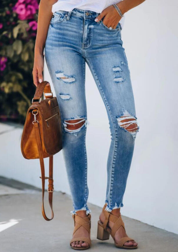 

Pants Ripped Hole Stretchy Frayed Hem Denim Jeans in Light Blue. Size