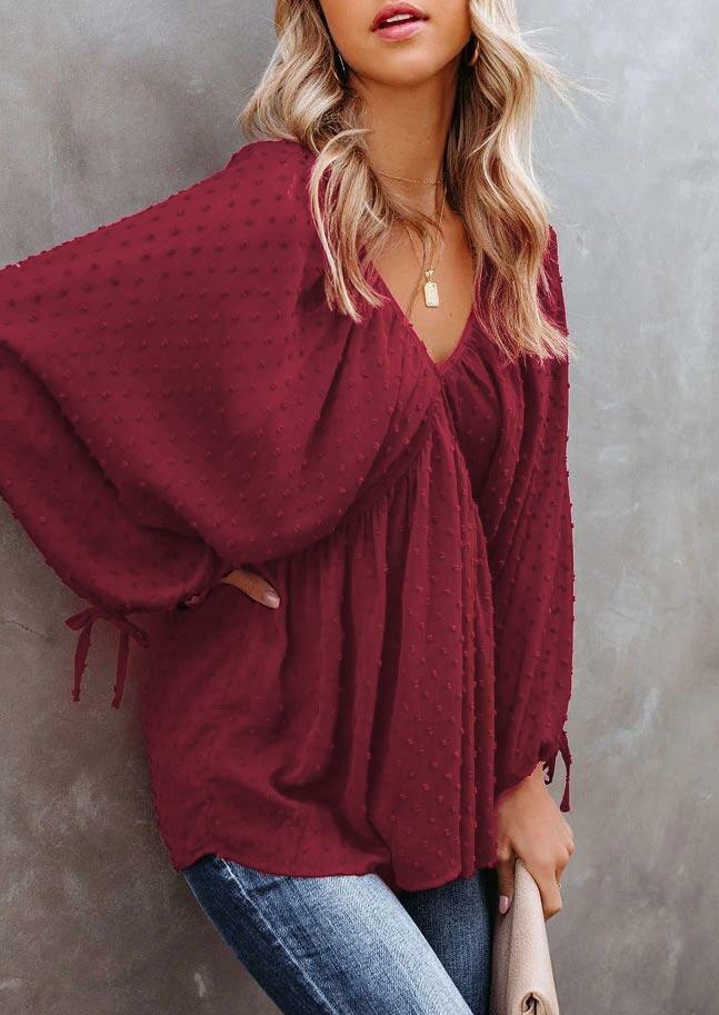 

Blouses Dotted Swiss Elastic Cuff Open Back Tie Blouse in Burgundy. Size: ,M