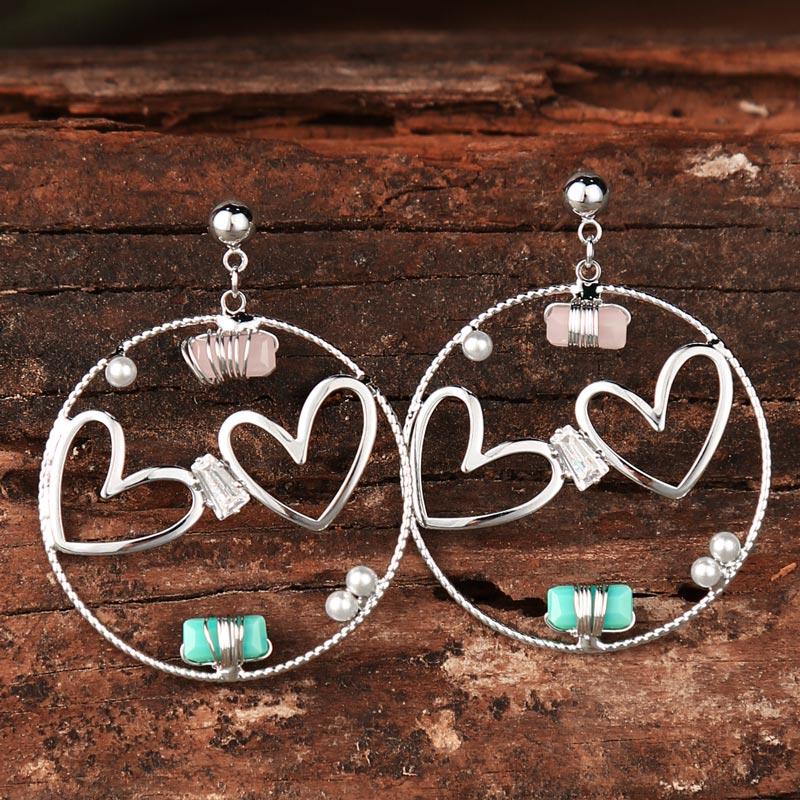 

Earrings Creative Hollow Out Love Heart Beading Earrings in Silver. Size