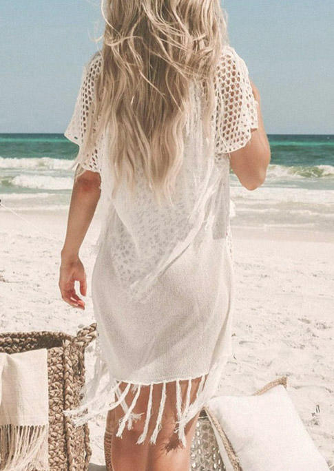 

Cover Ups Hollow Out Tassel Criss-Cross V-Neck Cover Up in Apricot. Size