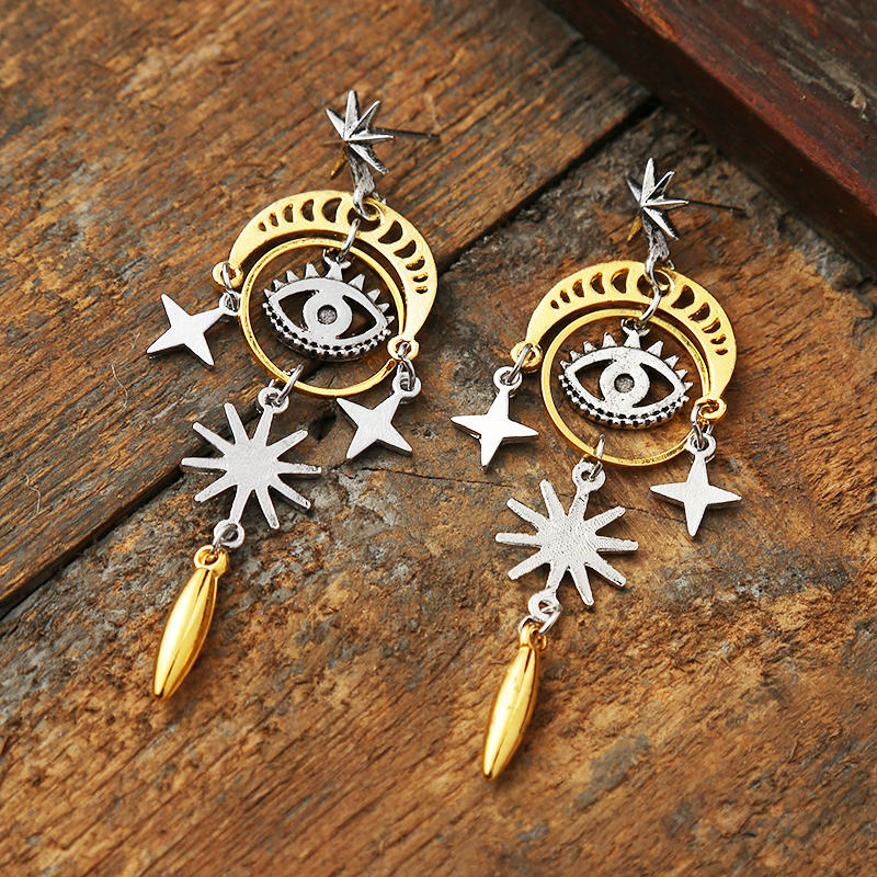 

Earrings Creative Hollow Out Moon Star Eye Alloy Earrings in Gold. Size