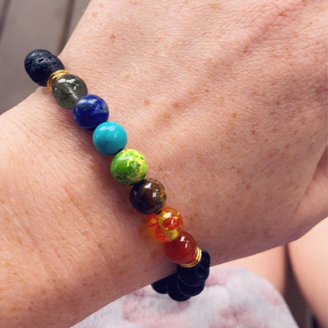 

Bracelet Lava Rock Stone Essential Oil Diffuser Bracelet in Black. Size
