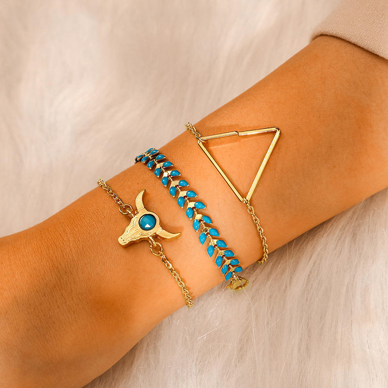 

Bracelet 3Pcs Steer Skull Wheat Triangle Bracelet Set in Gold. Size
