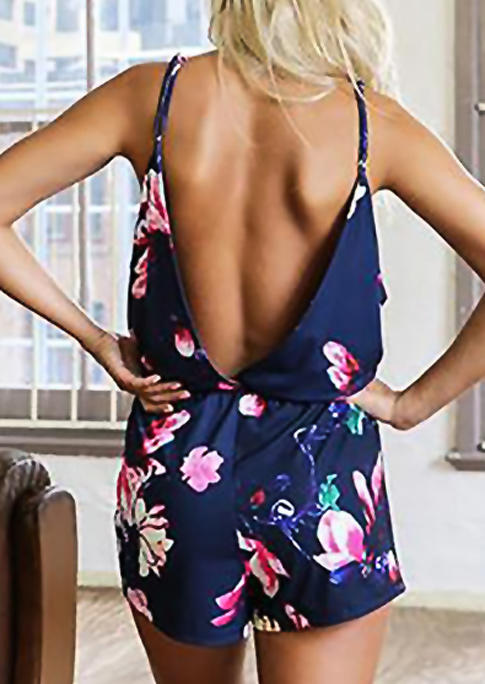 

Jumpsuits & Rompers Floral Open Back Adjustable Strap Romper in Navy Blue. Size