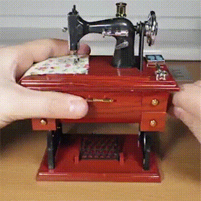 

Vintage Treadle Sewing Machine Music Box in Brown. Size