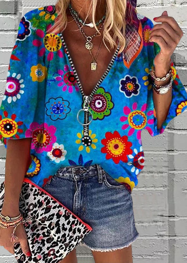 

Blouses Floral Zipper Collar Elastic Cuff Blouse in Blue. Size