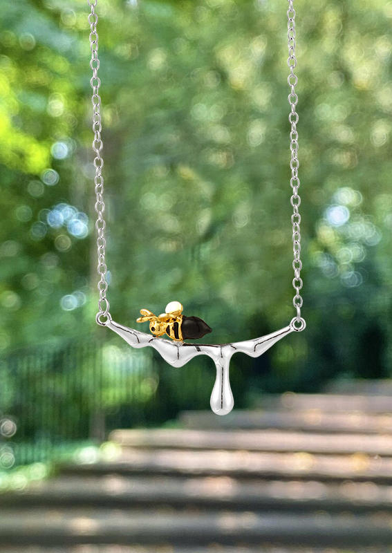 

Necklaces Bee And Dripping Honey Pendant Necklace in Silver. Size