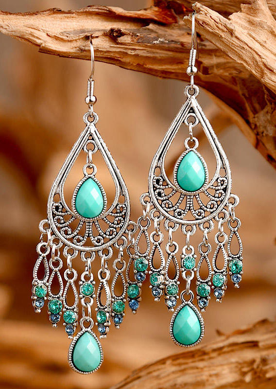 

Earrings Vintage Hollow Out Turquoise Water Drop Earrings in Cyan. Size