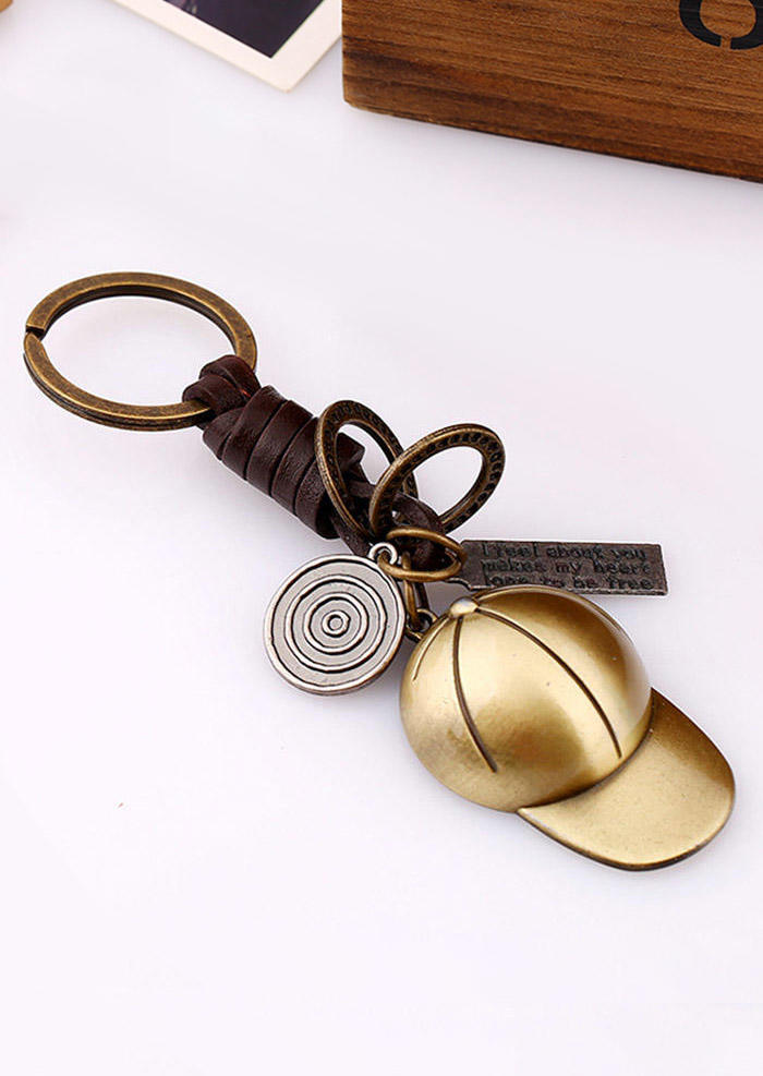 

Keychains Vintage Baseball Cap Cowhide Pendant Keychain in Gold. Size