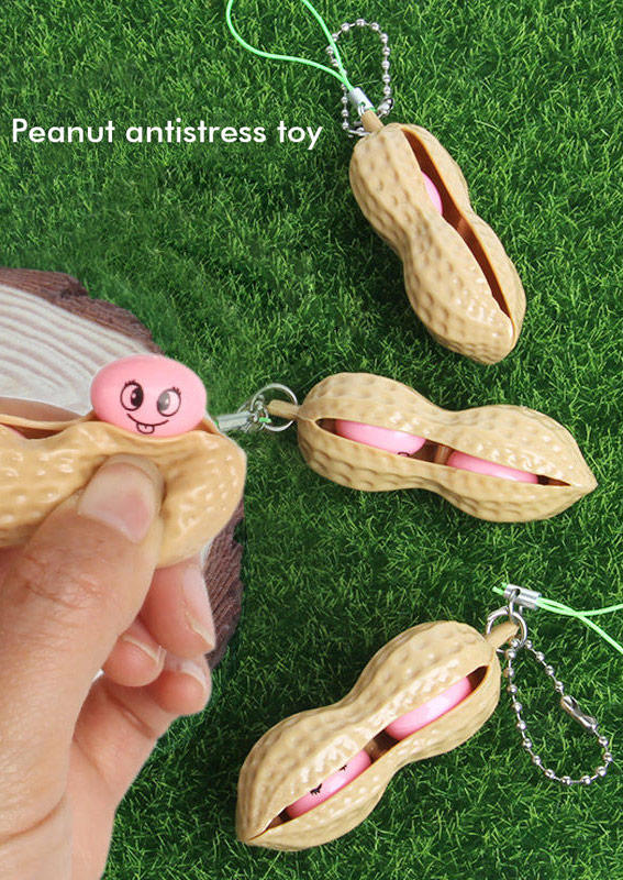 

Peanut Keychain Stress Relief Fidget Toy in Khaki. Size