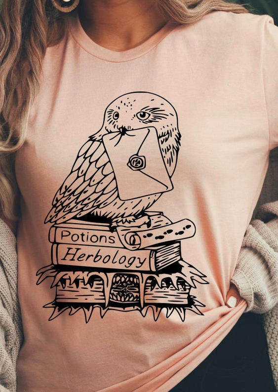 

T-shirts Tees Owl On Textbook Potions Herbology Wizard T-Shirt Tee in Pink. Size: ,M,L,XL