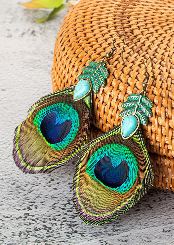 

Earrings Bohemian Turquoise Peacock Feather Earrings in Cyan. Size