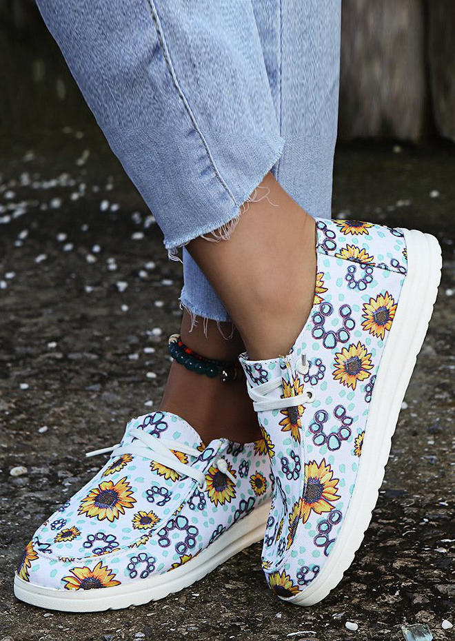 

Sneakers Sunflower Turquoise Slip On Flat Sneakers in White. Size