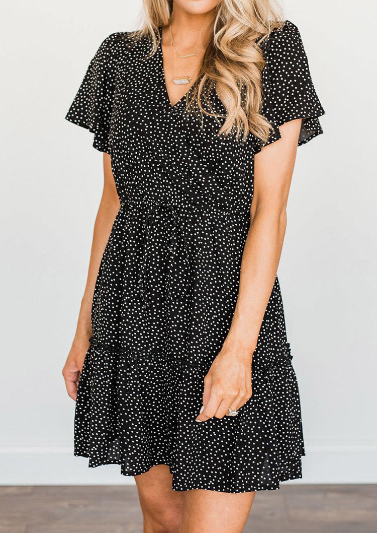 

Mini Dresses Polka Dot V-Neck Mini Dress in Black. Size