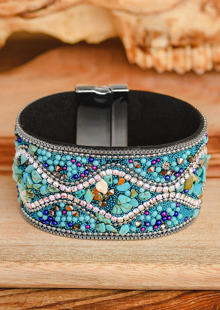 

Bracelet Bohemian Turquoise PU Leather Magnet Buckle Bracelet in Blue. Size