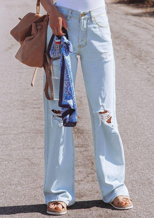 

Pants Ripped Hole Pocket Button High Waist Denim Jeans in Light Blue. Size