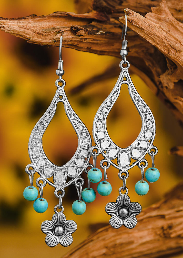 

Earrings Turquoise Floral Alloy Earrings in Silver. Size