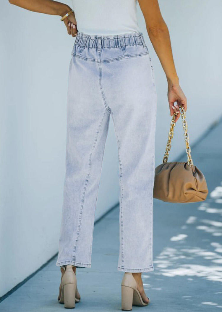 

Pants Pocket Button Denim Jeans Pants in Light Blue. Size