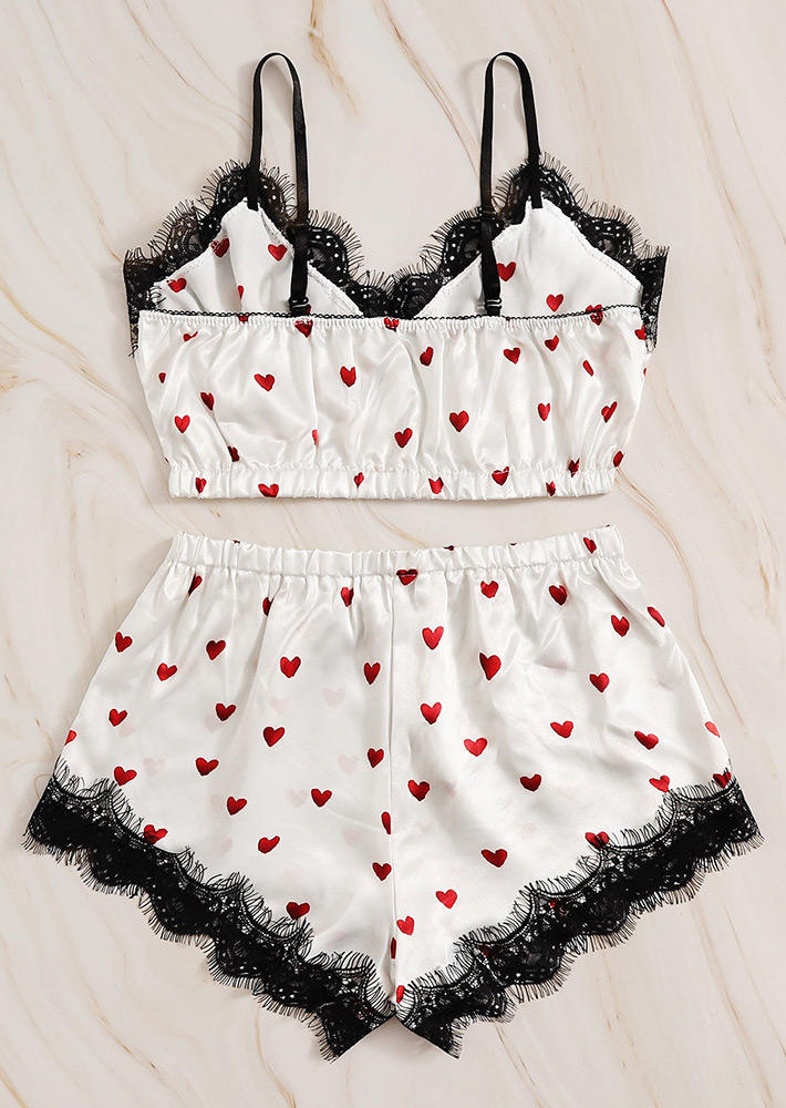

Sleepwear Lace Heart Camisole And Bowknot Shorts Pajamas Set in White. Size