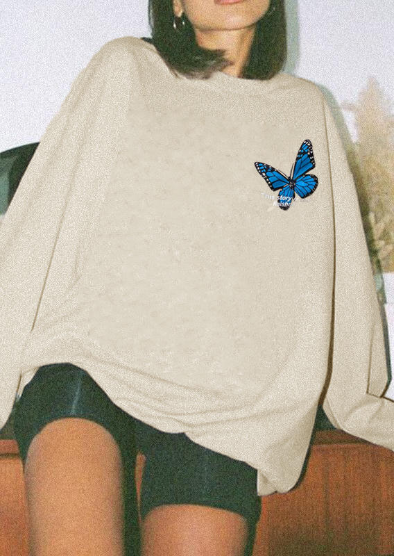 

Sweatshirts This Story Is Not Finished Butterfly Sweatshirt in Apricot. Size: ,M,L,XL