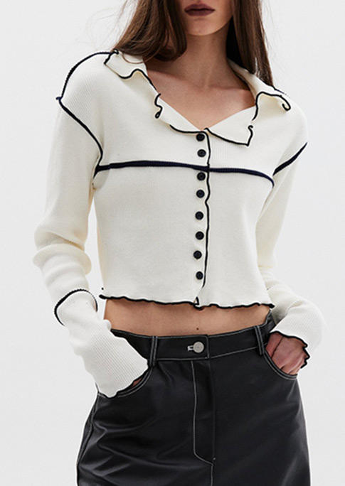 

Crop Tops Button Long Sleeve Crop Top in White. Size: ,M,L