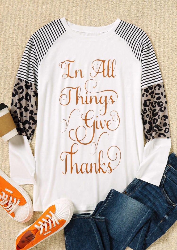 

Blouses In All Things Give Thanks Leopard Striped Blouse in White. Size: ,M,L,XL