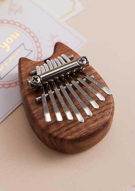 

Portable 8-Key Mini Kalimba Finger Thumb Piano in Pattern2. Size