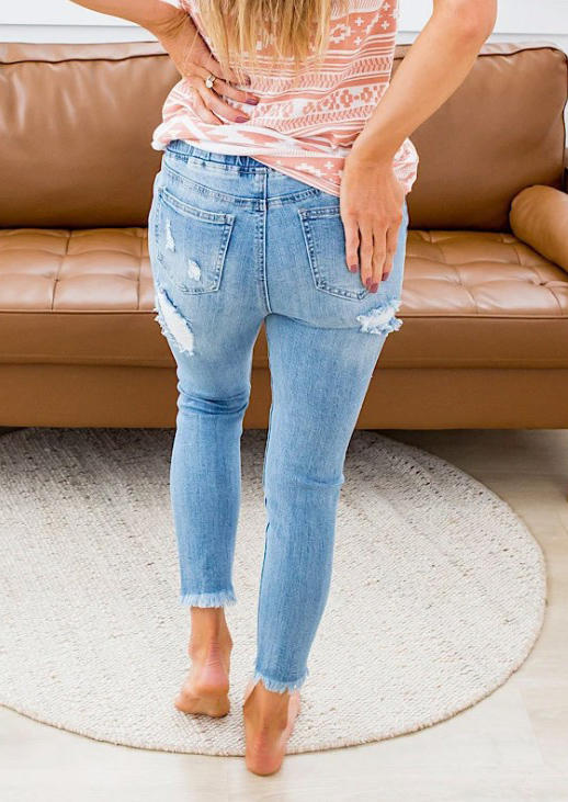 

Pants Ripped Hole Frayed Hem Pocket Denim Jeans in Light Blue. Size