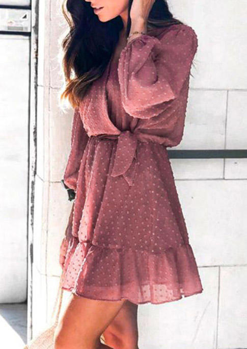 

Mini Dresses Dotted Swiss Ruffled Wrap Mini Dress in Cameo Brown. Size: ,M,L,XL