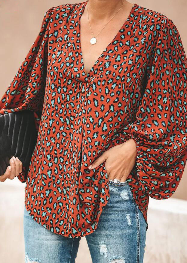 

Blouses Leopard Long Sleeve V-Neck Blouse in Orange. Size: ,M,L,XL