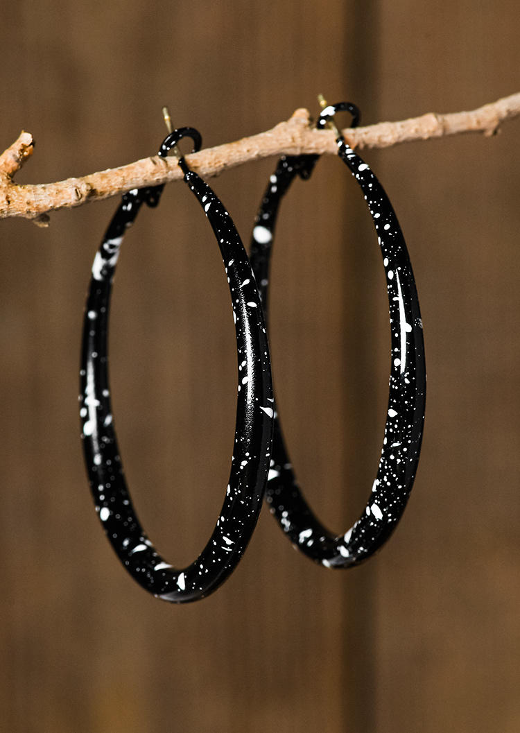 

Earrings Marble Cow Printed Round Earrings in Black,White. Size