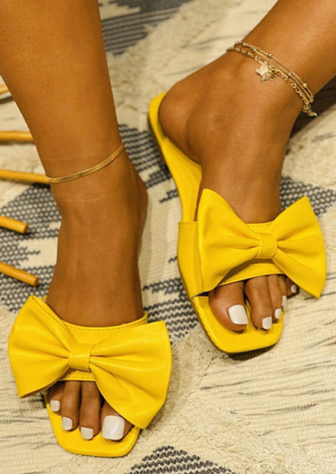 

Slippers Summer Beach Bowknot Slippers in Yellow. Size: ,38,39,40,41