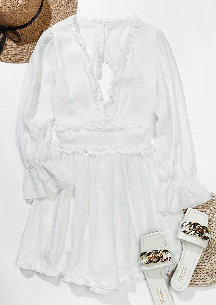 Jumpsuits & Rompers Ruffled Open Back V-Neck Romper in White. Size: L